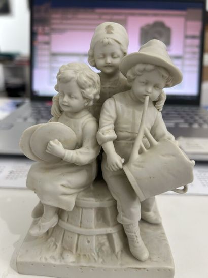 Group of children in bisque 
Modern work
Damage...