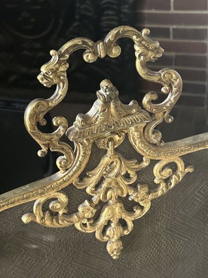 Four-leaf ormolu fire screen and carrying...