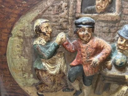 Two painted sheet metal plaques in relief
Tavern...