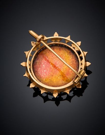 BROCHE circulaire en or jaune (750‰) ajouré,...