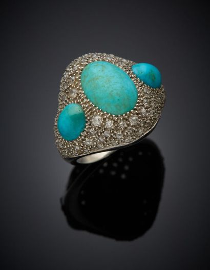 Large BAGUE en platine (950‰) orné de trois...