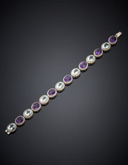 BRACELET en argent (925‰) articulé, serti...