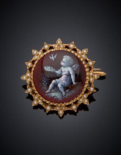 BROCHE circulaire en or jaune (750‰) ajouré,...