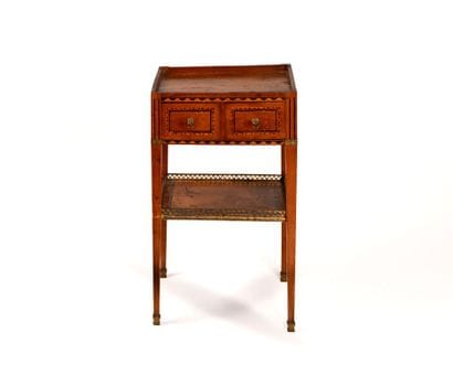 Small, rectangular coffee table made of natural...