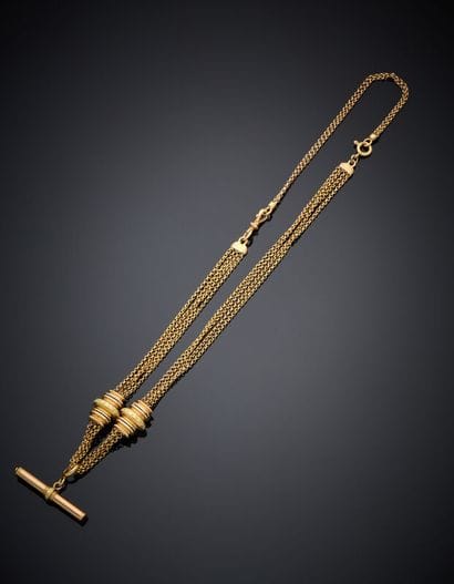 CHAINE GILETIERE en or jaune et or rose (750‰)...