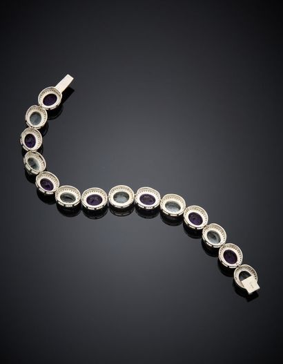 BRACELET en argent (925‰) articulé, serti...