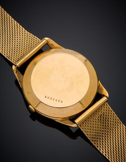 BRACELET MONTRE ronde d'homme en or jaune...