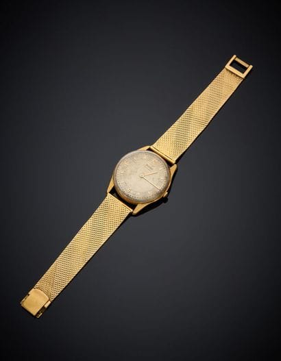 BRACELET MONTRE ronde d'homme en or jaune...