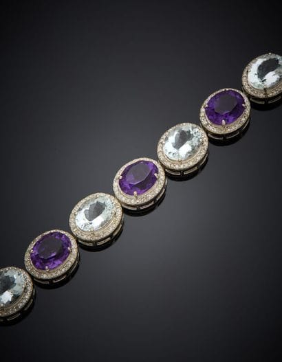 BRACELET en argent (925‰) articulé, serti...