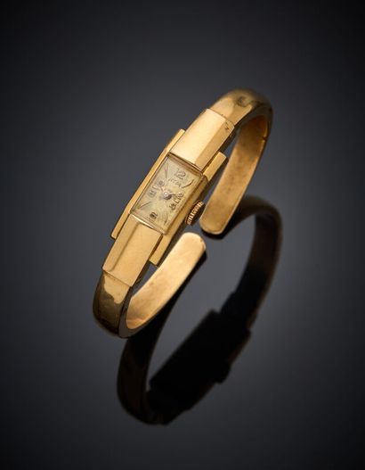 BRACELET MONTRE rectangulaire en or jaune...