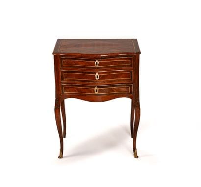 Small living room table, known as a “chiffonnière,”...