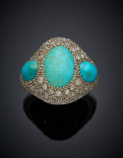 Large BAGUE en platine (950‰) orné de trois...