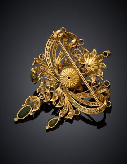BROCHE en or jaune (750‰) ajouré, serti de...