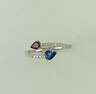 Crossed ring in white gold 750°/°° set with...