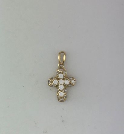 Cross in gold 750°/°° decorated with diamonds,...