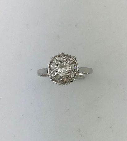 Platinum ring set with a cushion-shaped TA...