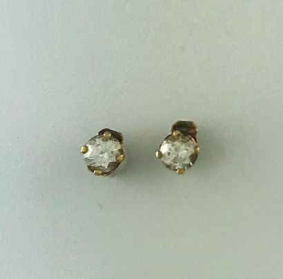 Pair of earrings in gold 750°/°° set with...