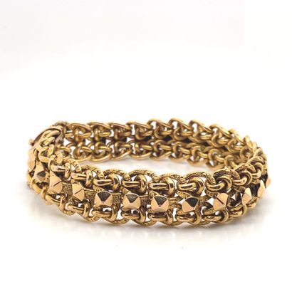 GOLD BRACELET (750‰) with flexible braided...