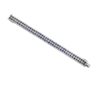 BRACELET SOUPLE en or gris et saphirs
FLEXIBLE...