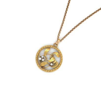 COLLIER en or et perles
Gold NECKLACE composed...
