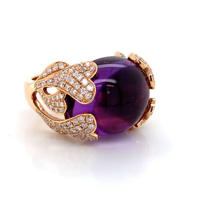 BAGUE bombée en or rose, améthyste en cabochon...