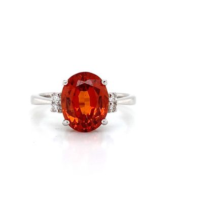BAGUE en or gris, grenat spessartite et diamants...