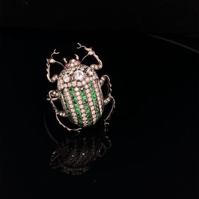BAGUE en or noirci, grenats tsavorites, diamants...