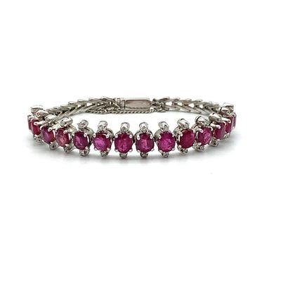 BRACELET en argent (800‰), rubis et diamants
Silver...