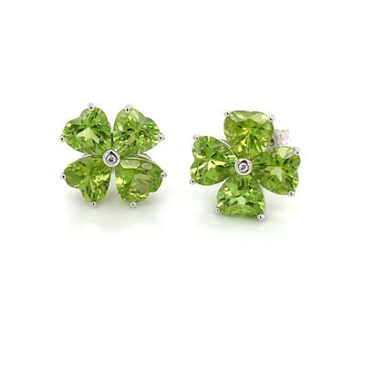 Paire de BOUCLES D'OREILLES en or gris, péridots...