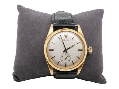 ROLEX
WATCH in gold (750‰) round bezel, cream...