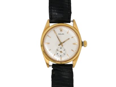ROLEX
WATCH in gold (750‰) round bezel, cream...