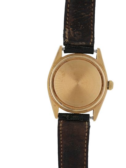 ROLEX
WATCH in gold (750‰) round bezel, cream...