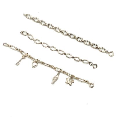 * Ensemble de trois GOURMETTES en argent...