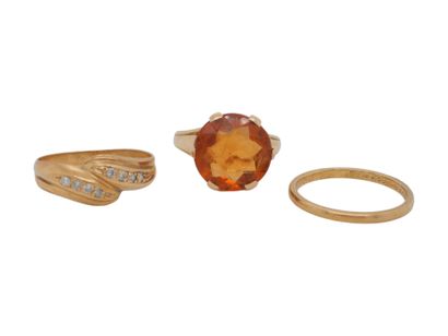 Réunion de trois BAGUES en or, citrine, diamants.
Réunion...