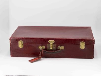 HERMÈS Paris
Petite valise gainée de cuir...