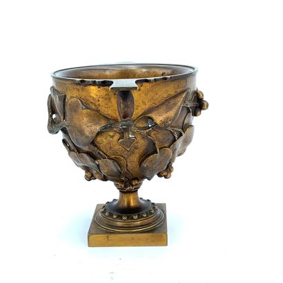 Gilt bronze bowl with two side handles and...