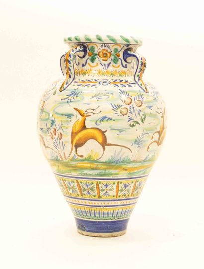 Large earthenware vase with four handles,...
