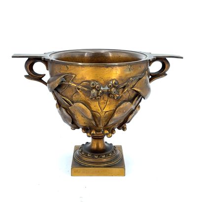 Gilt bronze bowl with two side handles and...