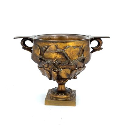 Gilt bronze bowl with two side handles and...