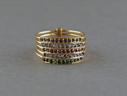 Bague caravansérail en or 750°/°° sertie...