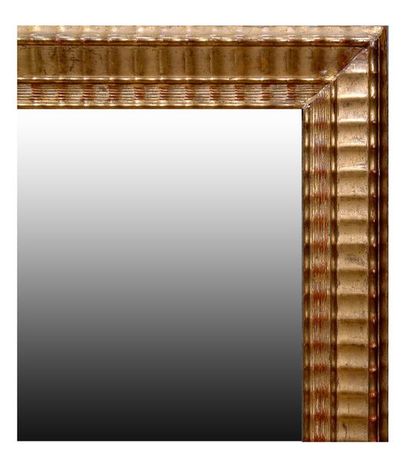 Miroir bordé d'une baguette côtelée. Ep....