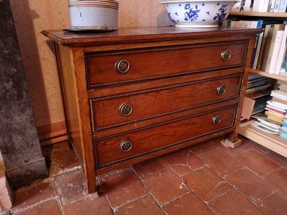 Small natural wood chest of drawers opening...