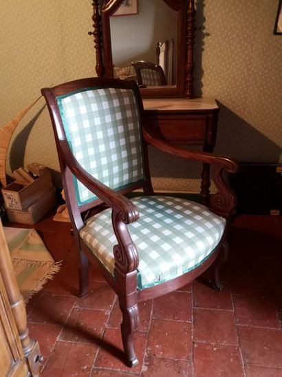Mahogany armchair with mahogany legs before...