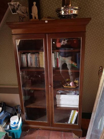 Small veneer shop window opening through...