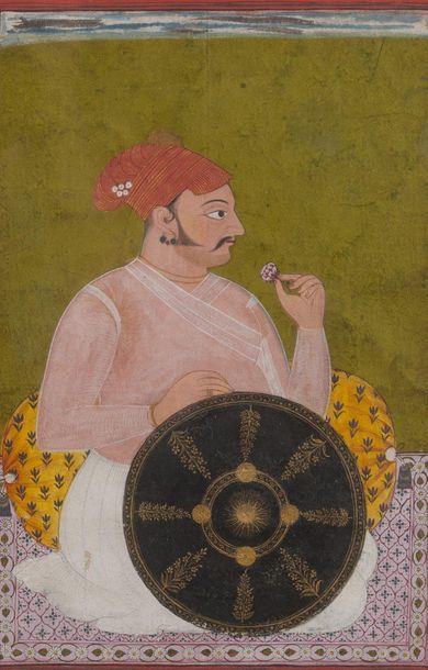 Portrait d’un dignitaire.

Le raja, vêtu...
