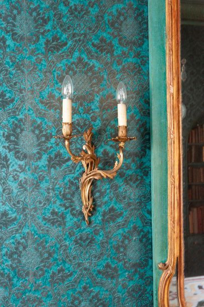 Pair of gilt bronze sconces with scrolls...