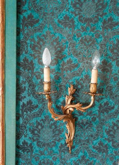 Pair of gilt bronze sconces with scrolls...