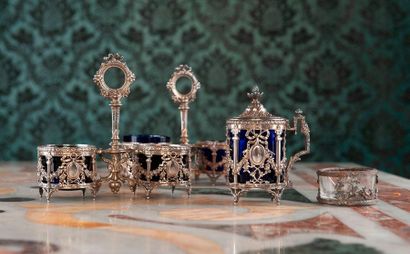 Silver table setting comprising a pair of...