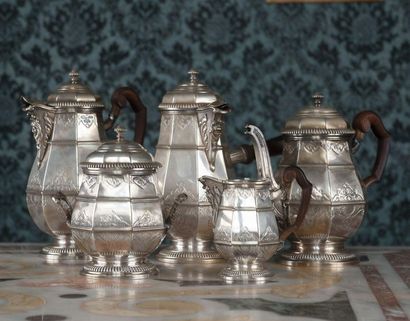Silver service decorated with mantling and...