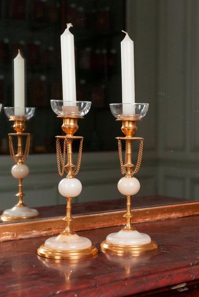 Pair of candlesticks in gilt bronze and alabaster...
